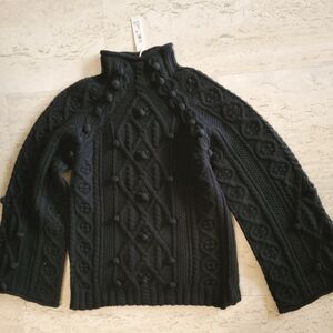 Beautiful Black long sleeve bulky knit turtleneck sweater. Size M.